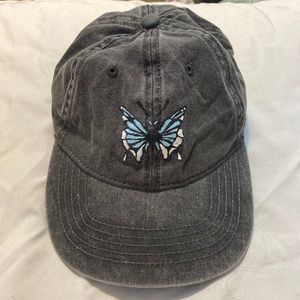 Black cap with butterfly design